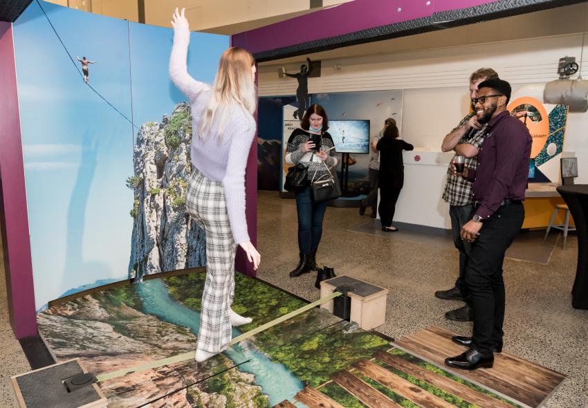 A women walking a tight rope 