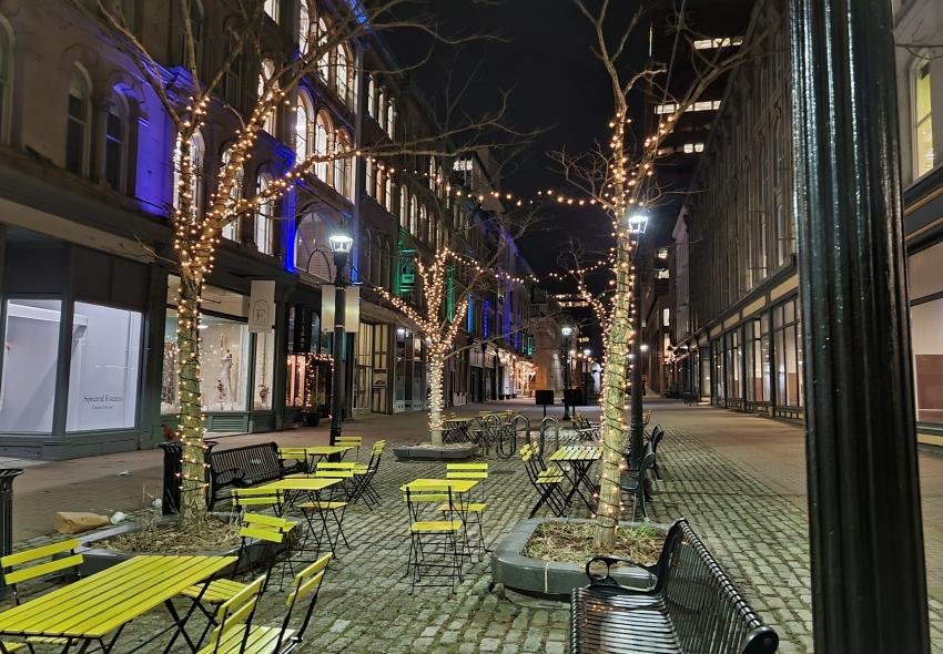 A Downtown park lit up at night