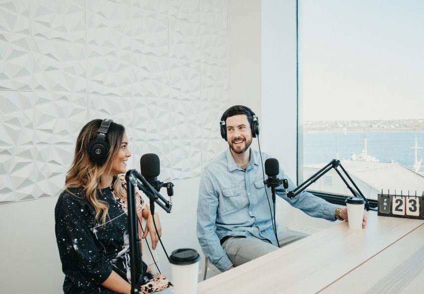 Two people doing a podcast