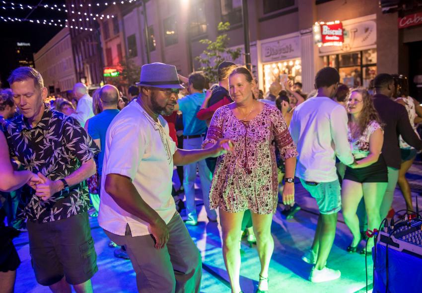 People dancing outdoors