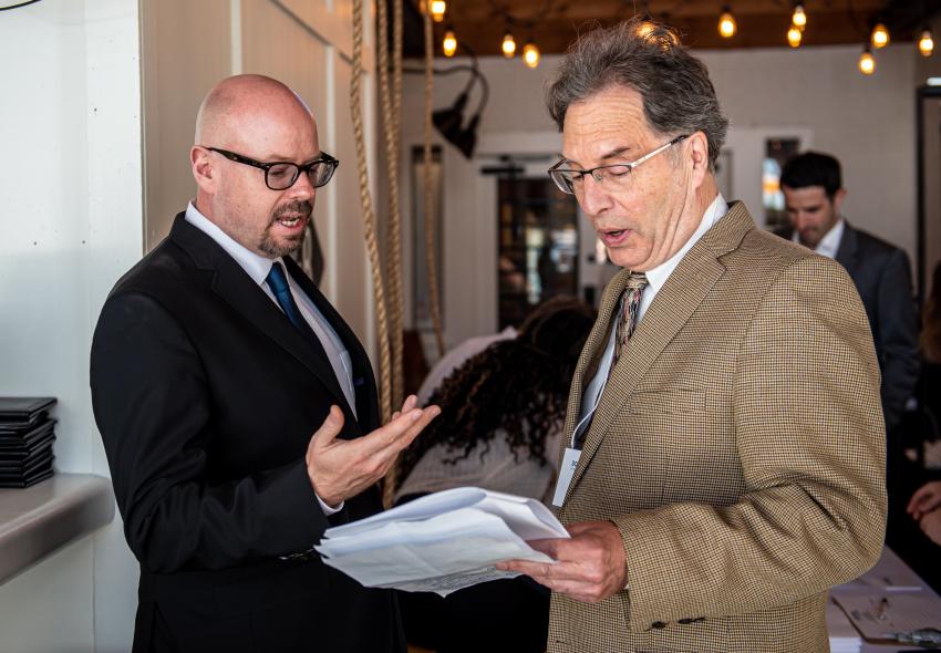 Two men talking to eachother