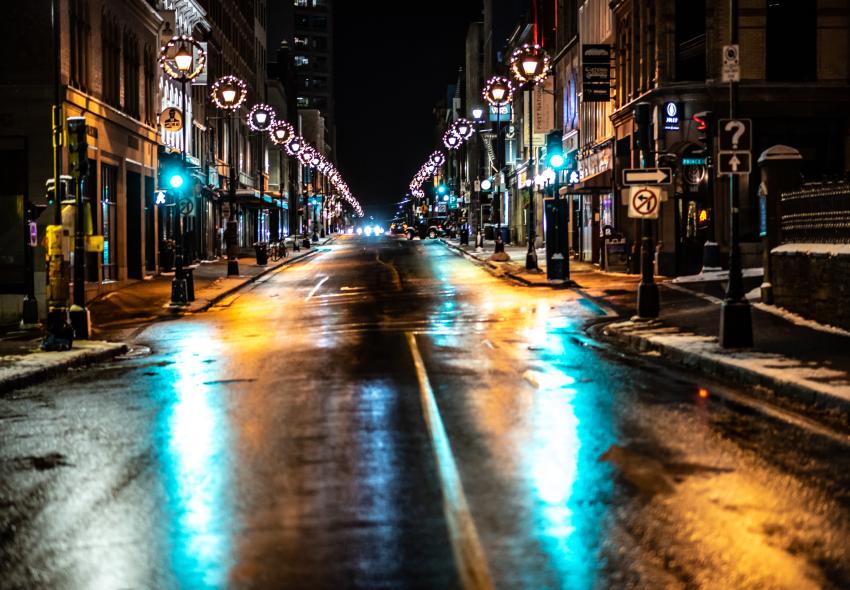 Holiday wreathes lit up at night