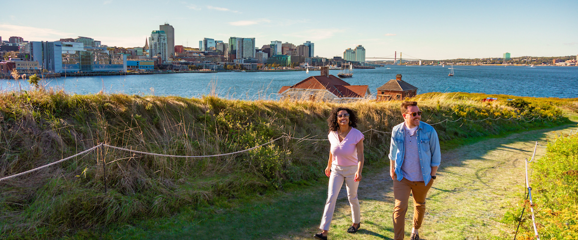 Couple walking on a trail on Georges Island National Historic Site