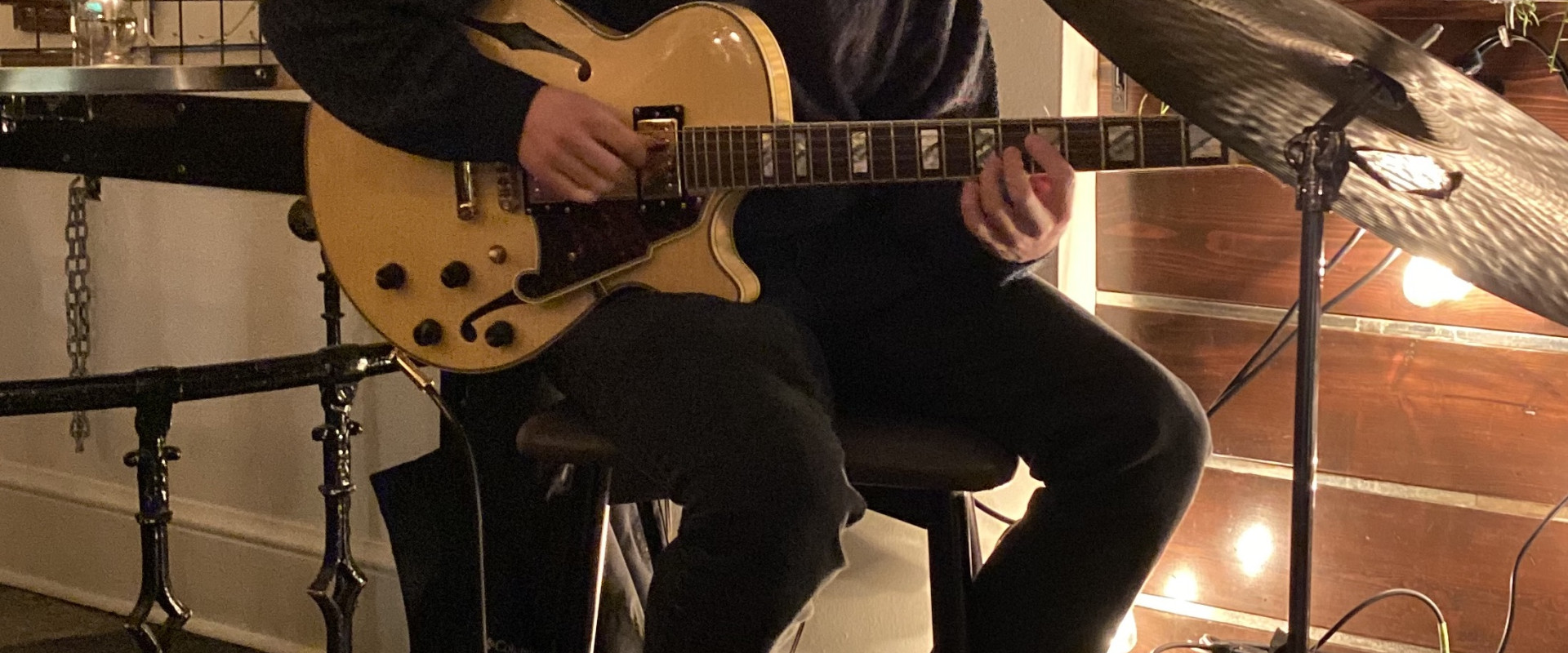 Gabe Mink playing guitar.