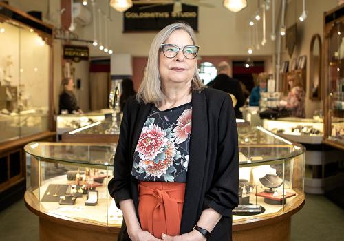 Photo of Judy Anderson, owner of FireWorks Gallery, in her store