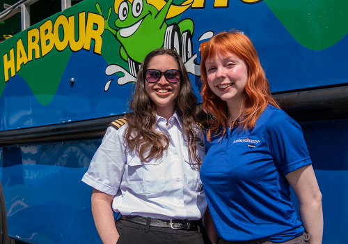 Captain Rachel and Abigail standing in front of the Harbour Hopper