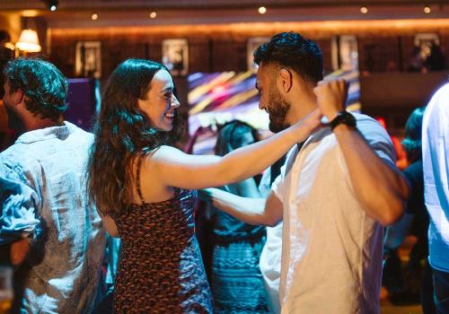 A couple dancing in a club